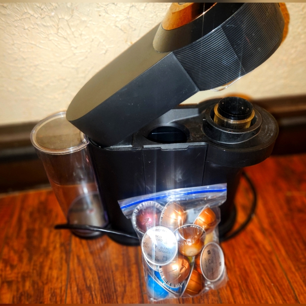 Nespresso Vertuo coffee machine with pods